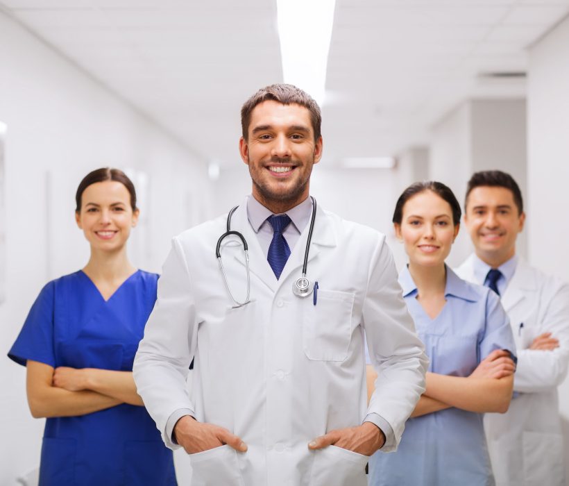 clinic-profession-people-health-care-medicine-concept-happy-group-medics-doctors-hospital-corridor-min